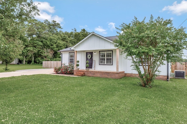 2312 Forrest Fields Dr, Chapel Hill, TN 37034 - view of front facade with board and batten siding, central AC unit, and a porch