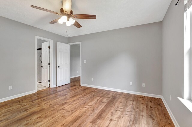 2312 Forrest Fields Dr, Chapel Hill, TN 37034 - unfurnished bedroom featuring baseboards, light wood-type flooring, and ceiling fan