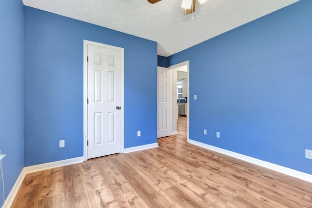 2312 Forrest Fields Dr, Chapel Hill, TN 37034 - unfurnished bedroom with baseboards, wood finished floors, and ceiling fan