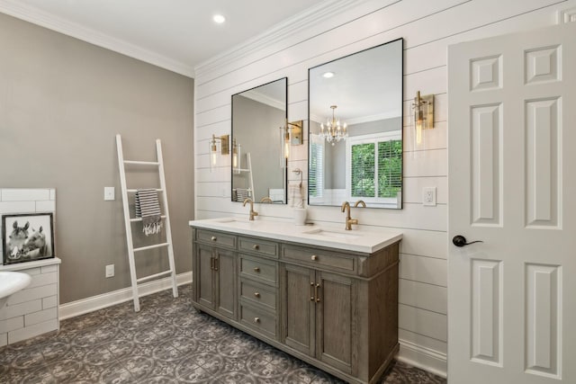 6321 Wescates, Brentwood, TN 37027 - bathroom featuring crown molding, double vanity, a chandelier, baseboards, and recessed lighting