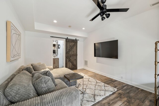 6321 Wescates, Brentwood, TN 37027 - living room with a barn door, baseboards, wood finished floors, ceiling fan, and recessed lighting