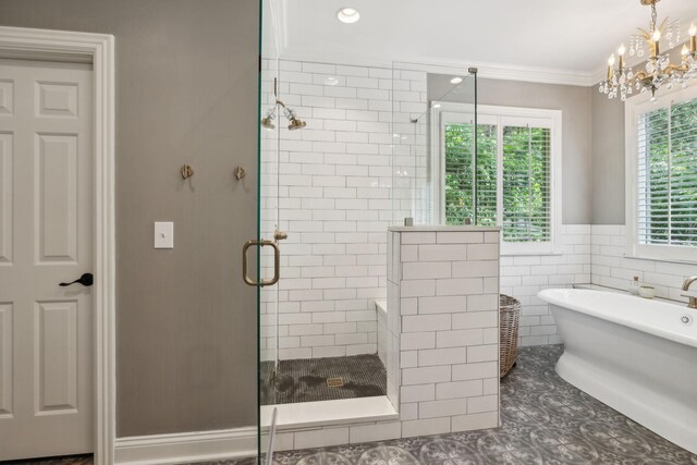6321 Wescates, Brentwood, TN 37027 - full bath with a shower stall, a freestanding bath, a chandelier, crown molding, and tile patterned flooring