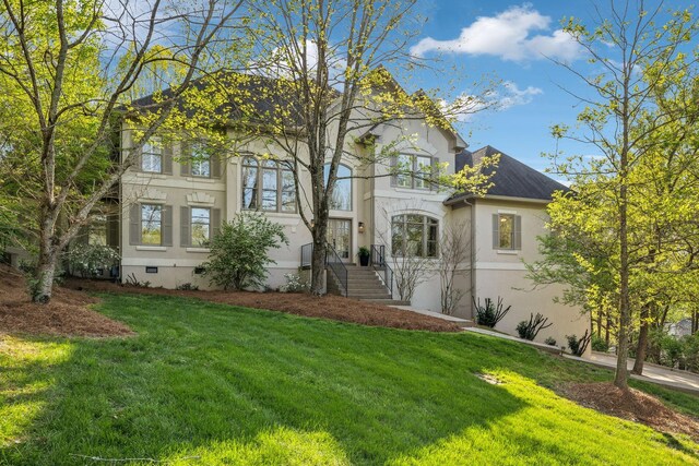 6321 Wescates, Brentwood, TN 37027 - view of front of property with stucco siding, a front lawn, and roof with shingles