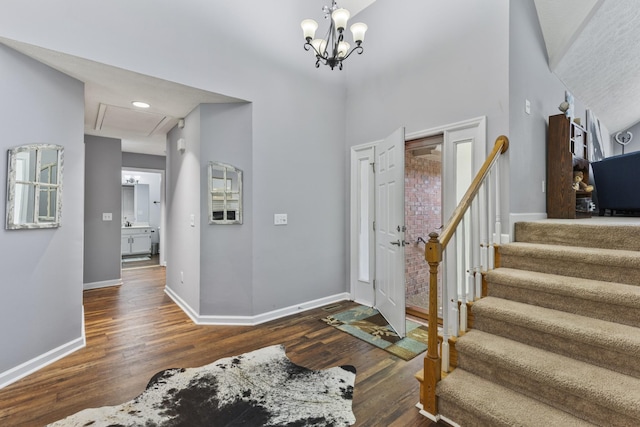 5156 W Oak Highland Dr, Antioch, TN 37013 - foyer with wood finished floors, baseboards, stairway, and a chandelier