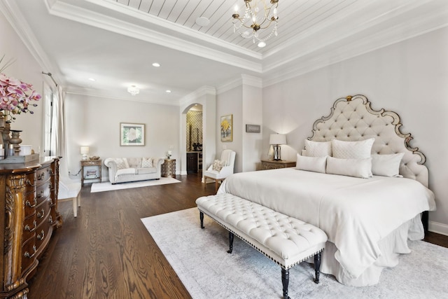 1234 Saddle Springs Dr, Thompsons Station, TN 37179 - bedroom with arched walkways, dark wood-style flooring, a chandelier, recessed lighting, and crown molding