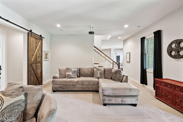 1234 Saddle Springs Dr, Thompsons Station, TN 37179 - carpeted living area with a barn door, stairs, recessed lighting, and baseboards