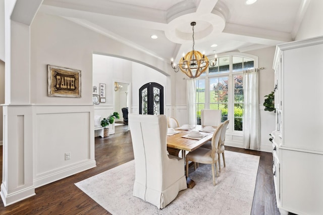 1234 Saddle Springs Dr, Thompsons Station, TN 37179 - dining space with arched walkways, a chandelier, ornamental molding, a decorative wall, and recessed lighting