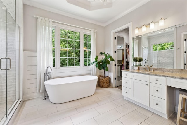1234 Saddle Springs Dr, Thompsons Station, TN 37179 - bathroom with vanity, a stall shower, a freestanding bath, and crown molding