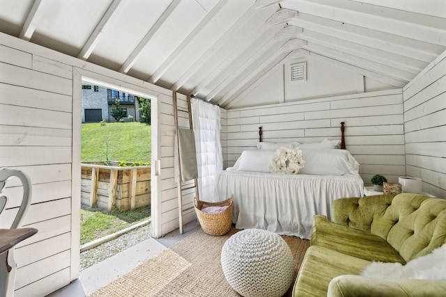 1234 Saddle Springs Dr, Thompsons Station, TN 37179 - bedroom with lofted ceiling, wood walls, and access to outside