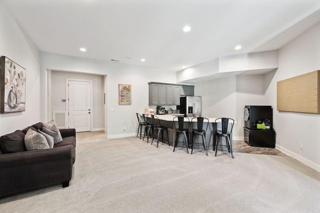 1234 Saddle Springs Dr, Thompsons Station, TN 37179 - living room with light carpet, baseboards, and recessed lighting