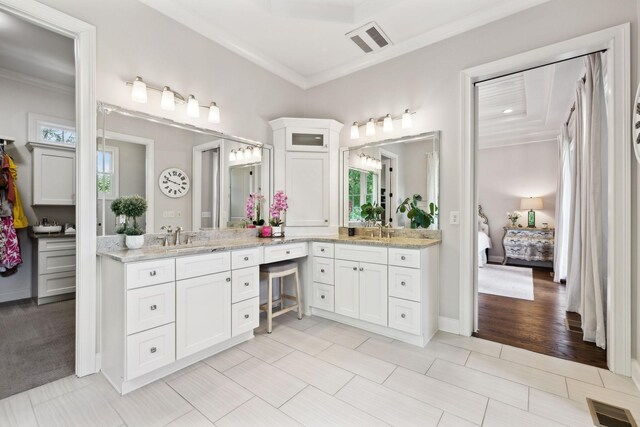 1234 Saddle Springs Dr, Thompsons Station, TN 37179 - full bathroom featuring ensuite bath, crown molding, and double vanity