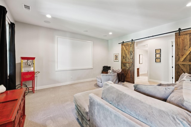 1234 Saddle Springs Dr, Thompsons Station, TN 37179 - living room with a barn door, light carpet, recessed lighting, and baseboards