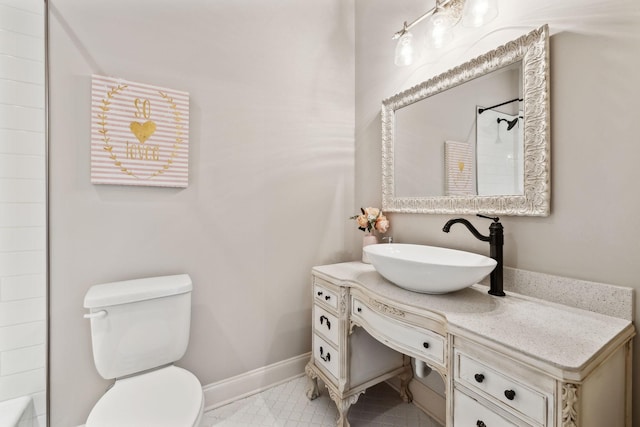 1234 Saddle Springs Dr, Thompsons Station, TN 37179 - full bathroom with vanity, toilet, baseboards, tile patterned floors, and a shower