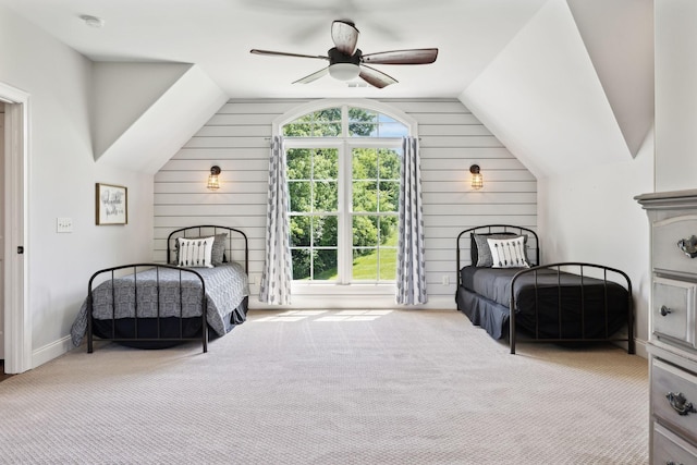 1234 Saddle Springs Dr, Thompsons Station, TN 37179 - bedroom with lofted ceiling, carpet flooring, wooden walls, and a ceiling fan