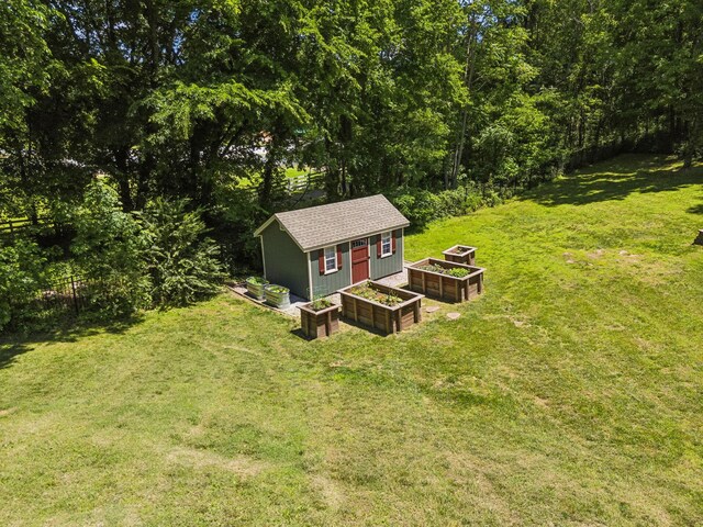 1234 Saddle Springs Dr, Thompsons Station, TN 37179 - view of yard with a garden and an outdoor structure