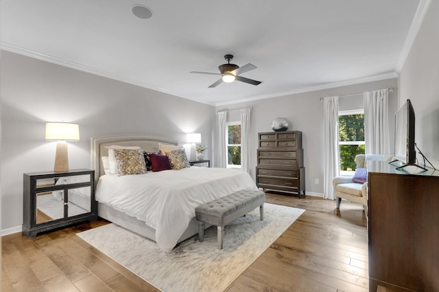 1154 Olde Cameron Ln, Franklin, TN 37067 - bedroom with wood-type flooring, crown molding, baseboards, and a ceiling fan