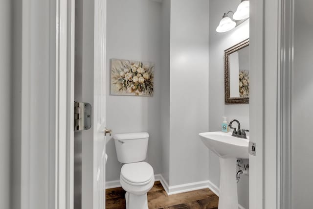 1154 Olde Cameron Ln, Franklin, TN 37067 - half bath featuring toilet, wood finished floors, and baseboards