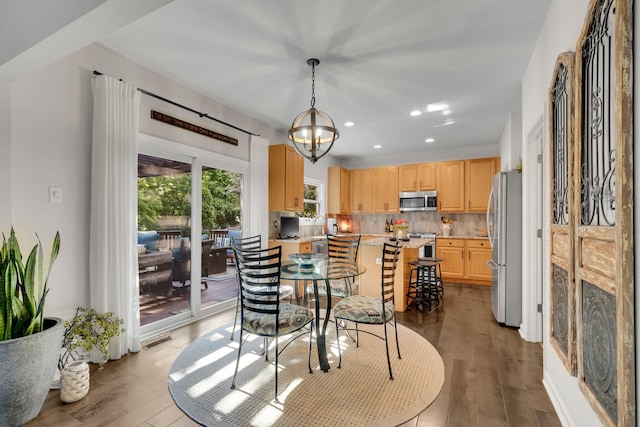 1154 Olde Cameron Ln, Franklin, TN 37067 - dining room with light wood-type flooring, recessed lighting, and a chandelier