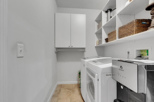 1154 Olde Cameron Ln, Franklin, TN 37067 - laundry area with baseboards and washer and clothes dryer