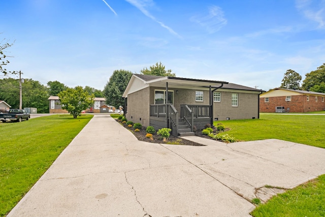 316 Bybee Branch Rd, Mcminnville, TN 37110 - view of front of house featuring a front lawn, brick siding, and a porch