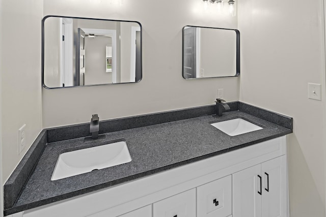 316 Bybee Branch Rd, Mcminnville, TN 37110 - bathroom with double vanity and a ceiling fan