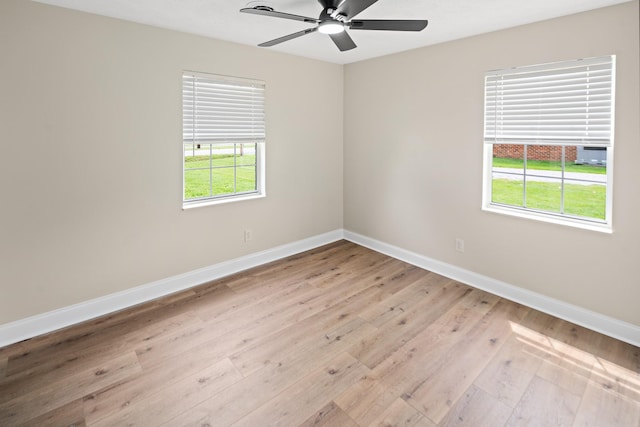 316 Bybee Branch Rd, Mcminnville, TN 37110 - empty room with baseboards, light wood-style flooring, and a ceiling fan