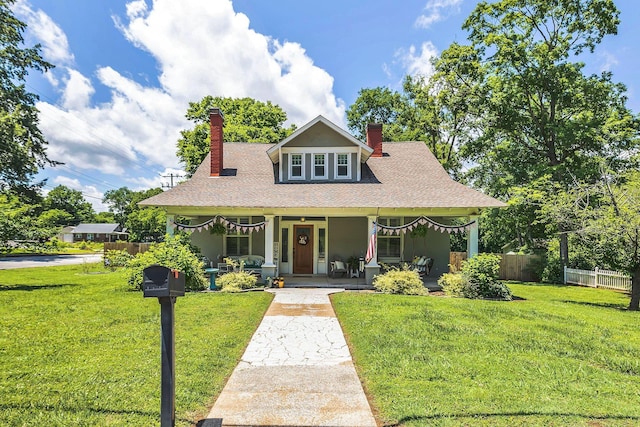601 N Main St, Mount Pleasant, TN 38474 - view of front of home featuring a chimney, covered porch, and a shingled roof