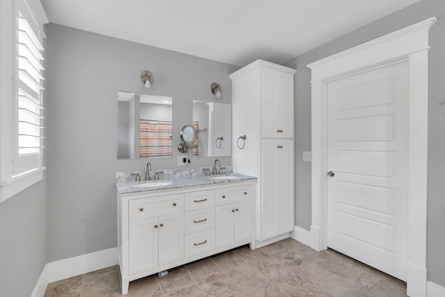 601 N Main St, Mount Pleasant, TN 38474 - full bath featuring double vanity, baseboards, and healthy amount of natural light