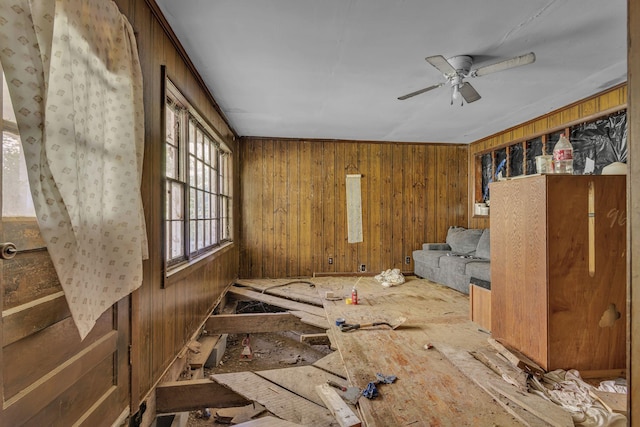 615 Oliver Smith Rd, Flintville, TN 37335 - unfurnished room with a ceiling fan and wood walls