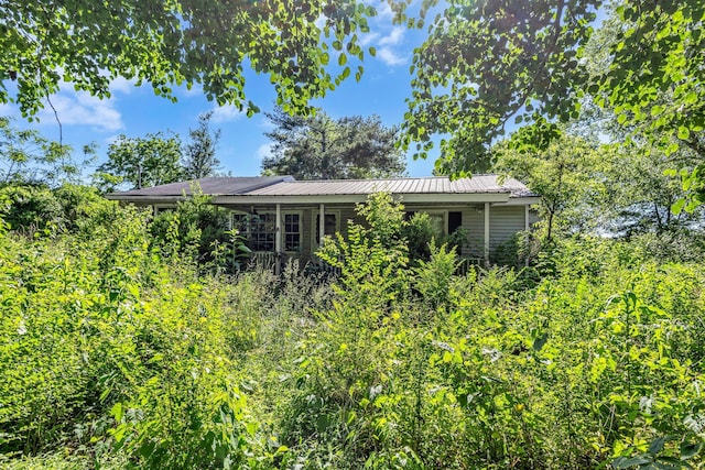 615 Oliver Smith Rd, Flintville, TN 37335 - view of home's exterior with metal roof