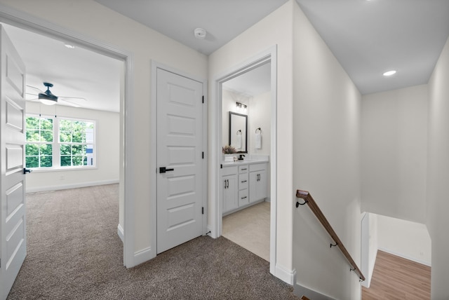 583 Pongracz Way, Clarksville, TN 37042 - hallway featuring an upstairs landing, light carpet, and baseboards
