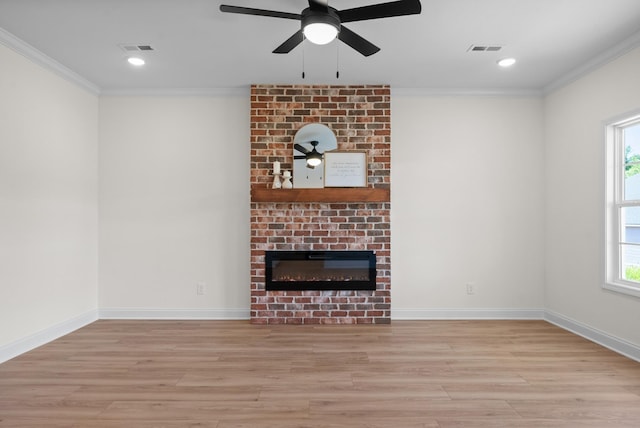 583 Pongracz Way, Clarksville, TN 37042 - unfurnished living room with ornamental molding, light wood-style flooring, plenty of natural light, ceiling fan, and recessed lighting