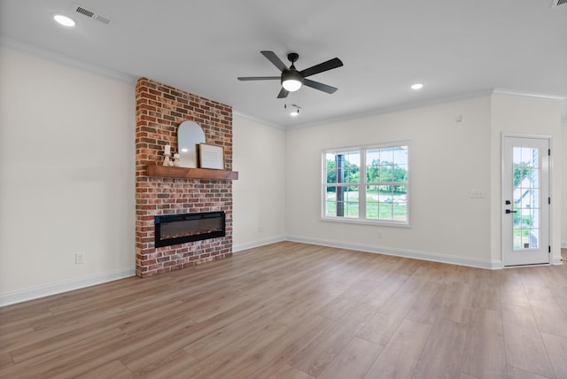 583 Pongracz Way, Clarksville, TN 37042 - unfurnished living room featuring crown molding, a ceiling fan, light wood finished floors, a fireplace, and baseboards