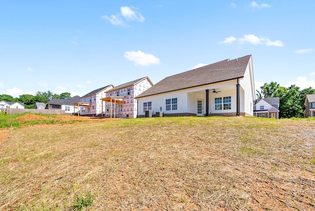 583 Pongracz Way, Clarksville, TN 37042 - back of house with a ceiling fan, a lawn, central air condition unit, and a residential view