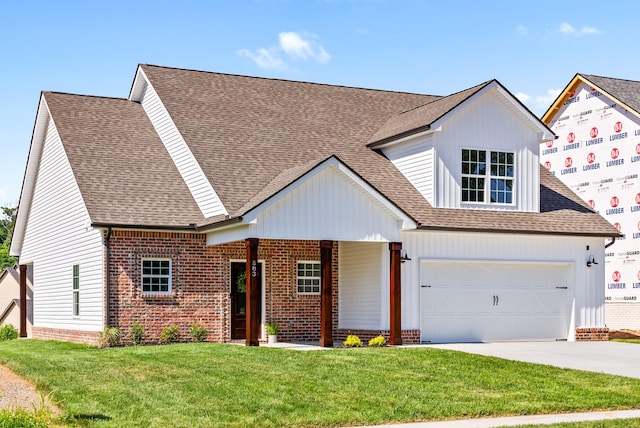 583 Pongracz Way, Clarksville, TN 37042 - view of front of house featuring brick siding, driveway, a front yard, and a shingled roof