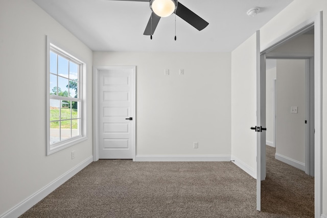 583 Pongracz Way, Clarksville, TN 37042 - unfurnished room featuring carpet flooring, a ceiling fan, baseboards, and a smoke detector