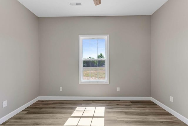 115 Carl Williams Rd, Crofton, KY 42217 - empty room featuring wood finished floors, baseboards, and ceiling fan