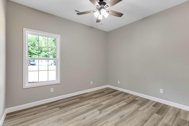 115 Carl Williams Rd, Crofton, KY 42217 - unfurnished room with light wood finished floors, baseboards, and ceiling fan