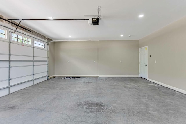 115 Carl Williams Rd, Crofton, KY 42217 - garage featuring a garage door opener, baseboards, and recessed lighting