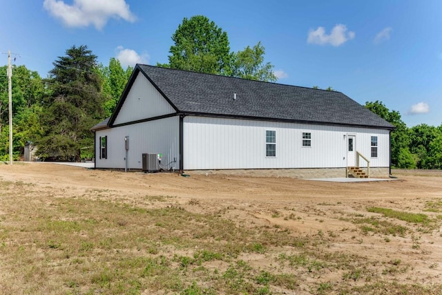 115 Carl Williams Rd, Crofton, KY 42217 - rear view of house with entry steps, central AC unit, and roof with shingles