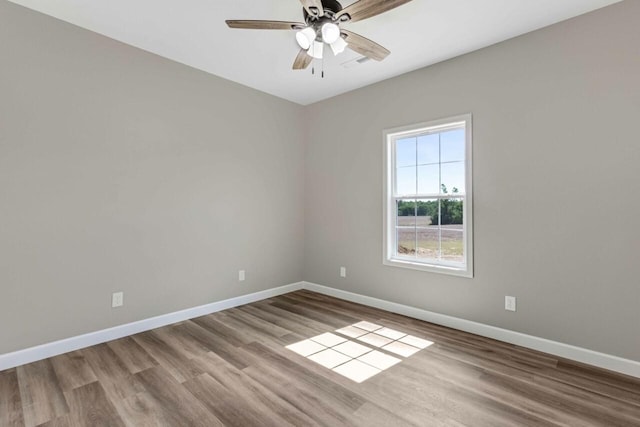 115 Carl Williams Rd, Crofton, KY 42217 - spare room with baseboards, wood finished floors, and ceiling fan