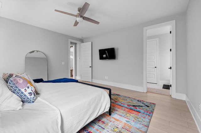 4010 Planters Trl, Mount Juliet, TN 37122 - bedroom featuring light wood-style floors, baseboards, and ceiling fan