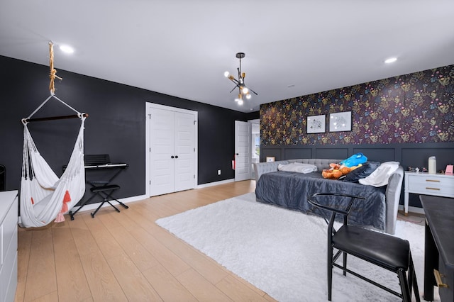 4010 Planters Trl, Mount Juliet, TN 37122 - bedroom featuring wood finished floors, an office area, a chandelier, and baseboards