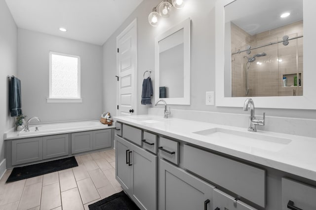 4010 Planters Trl, Mount Juliet, TN 37122 - full bathroom with a shower stall, double vanity, a bath, and recessed lighting
