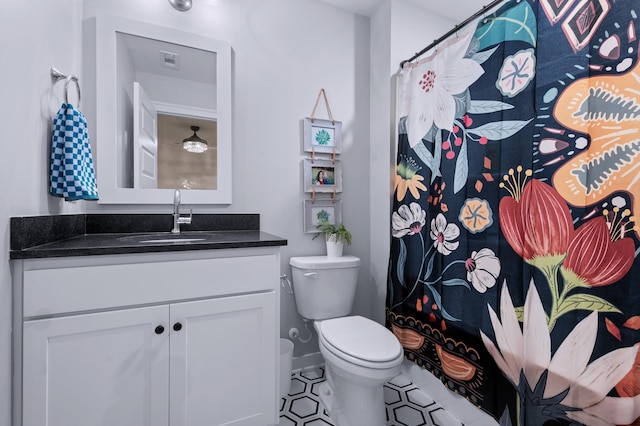4010 Planters Trl, Mount Juliet, TN 37122 - full bath with vanity, toilet, a shower with curtain, and baseboards