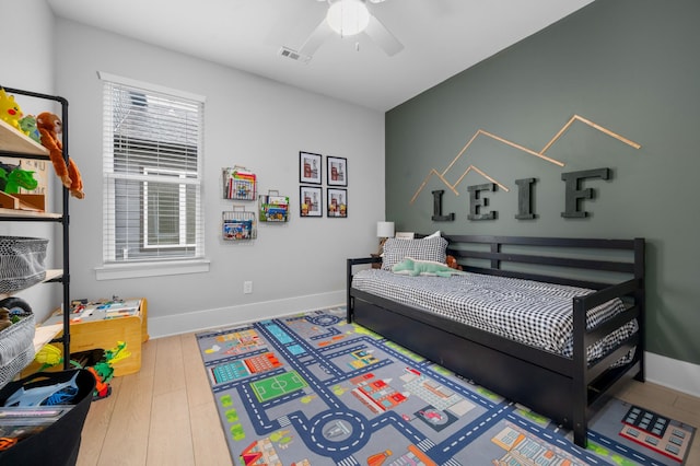 4010 Planters Trl, Mount Juliet, TN 37122 - bedroom featuring baseboards, a ceiling fan, and wood finished floors