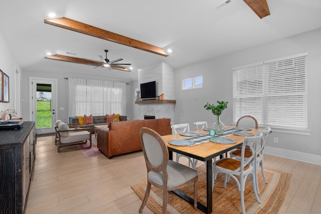 4010 Planters Trl, Mount Juliet, TN 37122 - dining room with beamed ceiling, light wood-type flooring, plenty of natural light, a fireplace, and ceiling fan