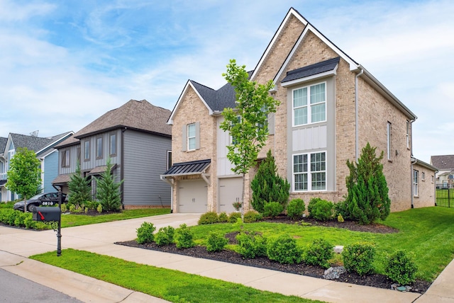4010 Planters Trl, Mount Juliet, TN 37122 - view of front of house featuring driveway, brick siding, an attached garage, a front yard, and board and batten siding