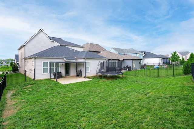 4010 Planters Trl, Mount Juliet, TN 37122 - back of house with a trampoline, a patio, and a residential view