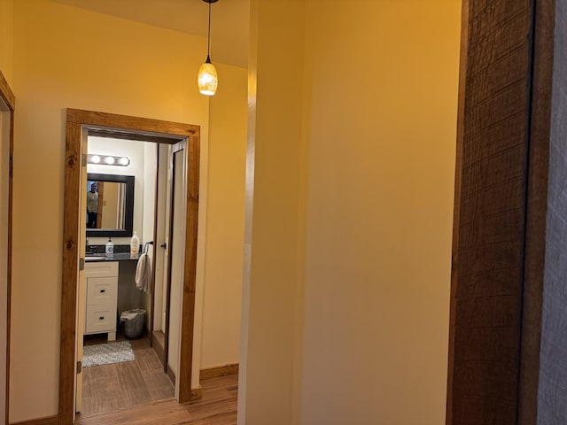 1829 Lobelville Hwy, Linden, TN 37096 - hallway featuring light wood-style floors and a sink